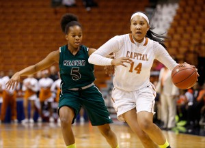 Capital Prep Trailblazers Taylor Williams (14) drives against Weaver's Shaquana Edwards (5) during the first half in the championship game of the 2014 CIAC Basketball Tournament at Mohegan Sun Arena.